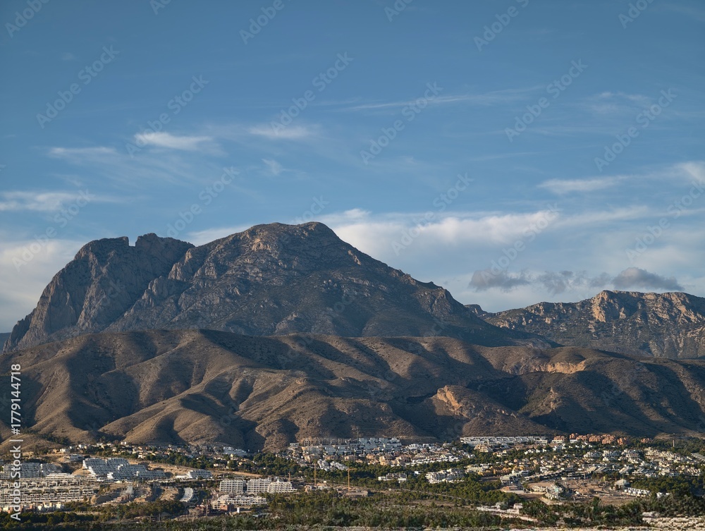 Fototapeta premium majestic mountain crest dominates suburban landscape with picturesque vistas and outdoor paths