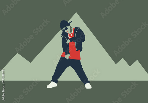 Rapper wearing sunglasses and chain poses with mountains behind.