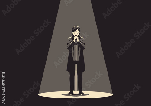 Person stands in spotlight, hands clasped in prayer or anticipation.