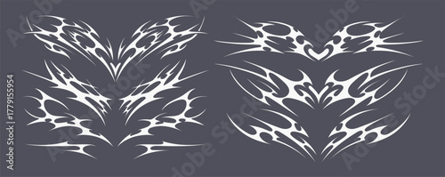 Neo tribal womb tattoo collection. Symmetrical flame-shaped designs for belly, chest or lower abdomen placement in liquid style. Vector set