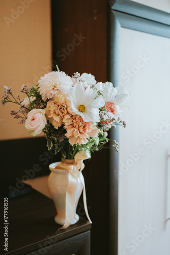 wedding bouquet in the hands of the bride