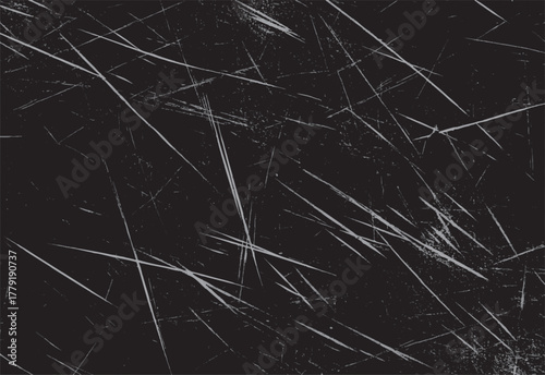 Dark grey textured background with numerous thin light grey scratches and speckles grunge