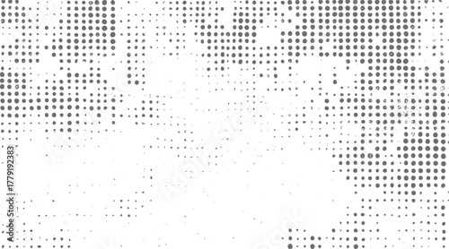Abstract grayscale pattern of varying sized dots and speckles on a white background creating a textured effect