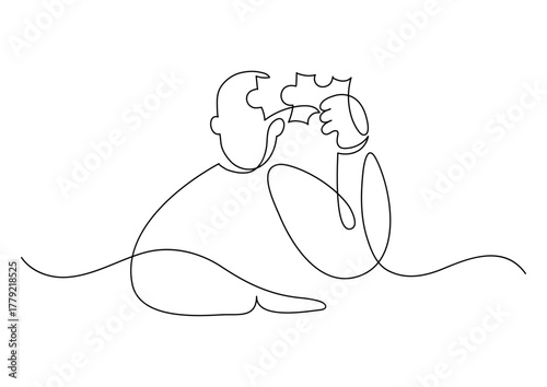 Philosophy, psyhology concept. Thinking man puts missing piece of the puzzle in the head.