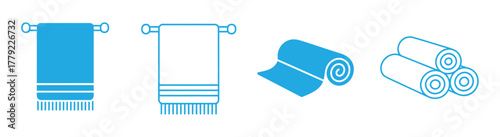 Clean, fresh blue towels displayed on a rack and rolled neatly, perfect for spa, hotel, or home decor concepts needing a touch of serene hygiene and comfort.