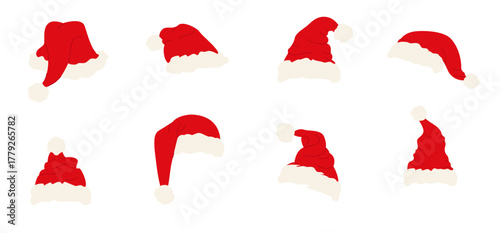 A set of red Santa hats of various shapes on a white background. A festive Christmas headdress with white fur trim and a pom-pom. A traditional Christmas element.