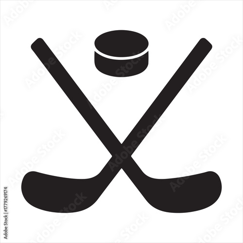 Ice hockey game equipment icon with two crossed sticks and a puck isolated on white background