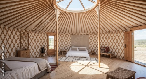 sunlit interior of luxury yurt bedroom with wooden structure and skylight. glamping and eco-tourism concept. unique accommodation for nature retreat. banner, website header.