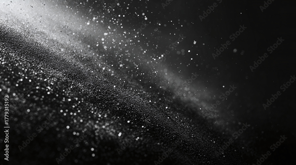 Obraz premium An abstract image featuring particles and a play of light, creating a sense of wonder and cosmic beauty. The image is filled with scattered specks and a dynamic interplay of light