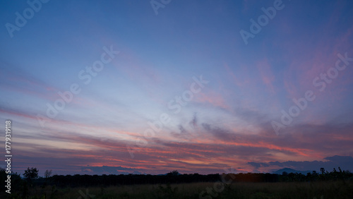 Landscape of sunrise sky background with gentle colorful clouds