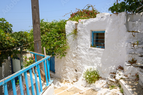 Fototapeta Naklejka Na Ścianę i Meble -  Old narrow street in Lagada village on the island of Amorgos. Cyclades, Greece