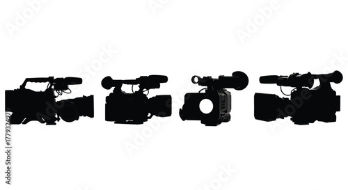 Four video cameras in a row isolated on white background for film production