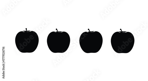 Four black apple silhouettes isolated on white background, representing fruit