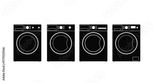 Four washing machines isolated on white background are shown in a row