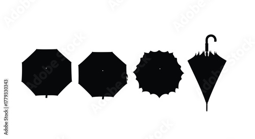 Four black umbrellas isolated on white background are displayed in the image