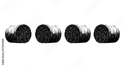 Four hay bales in a row isolated on white background