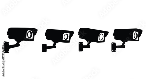 Four surveillance cameras in silhouette isolated on white background