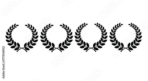 Four black laurel wreaths isolated on white background, symbolizing victory