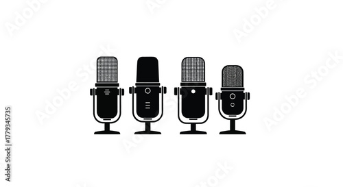 Four vintage microphones isolated on white background, ready for recording