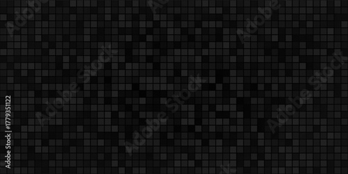 Abstract dark background of small squares or pixels in shades of black and gray colors.