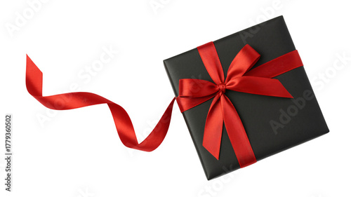 Elegant black gift box with vibrant red satin ribbon bow and flowing tail, perfect for celebrations and special occasions