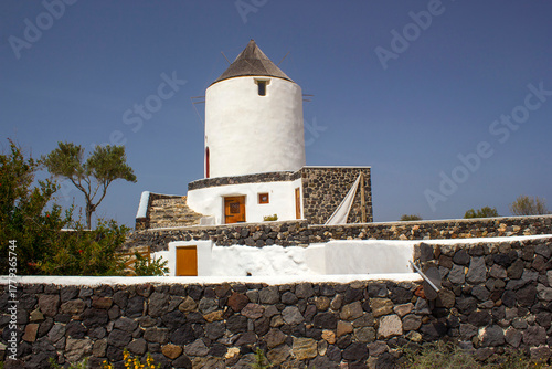 Old wind mill on the Gavrilos hill in Santorini, Greece