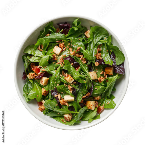 Fresh Mixed Green Salad With Apple Chunks and Granola Served in a White Bowl