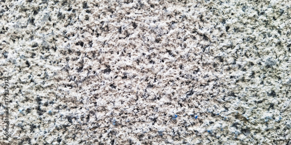 Obraz premium Close Up Texture Of Speckled Granite Stone With Subtle Pink And Green Hues Creating A Natural Abstract Pattern