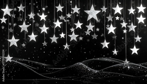 Black and white image of hanging stars with curved lines and sparkles