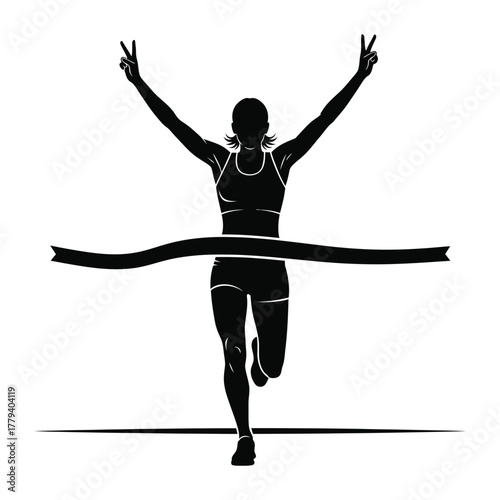 Runner crossing finish line with arms raised in victory sign