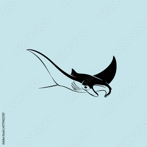 Elegant manta ray gliding gracefully through tranquil waters, showcasing its majestic wingspan