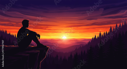 Silhouette of a man sitting on a cliff watching the sunset over mountains.