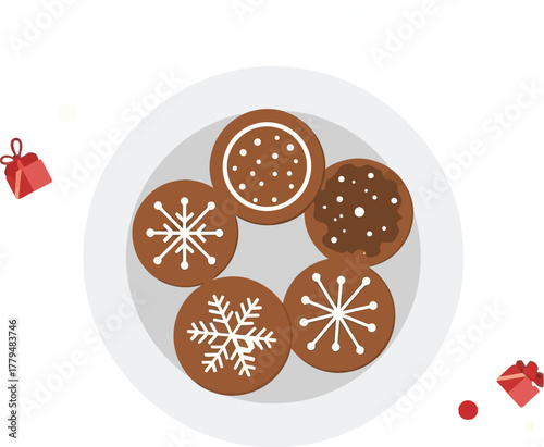 Festive christmas cookies on a plate with holiday decorations flat lay design