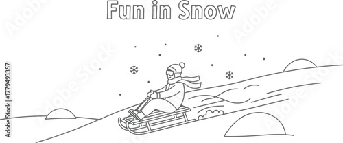 Child enjoys winter fun sledding down a snowy hill on a bright winter day scene