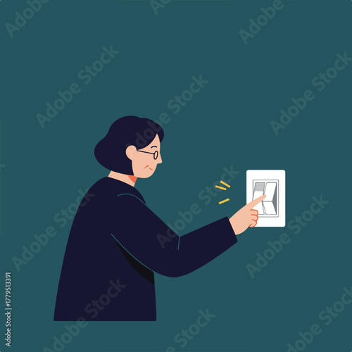 A person with glasses is about to turn on or off a light switch on a green wall