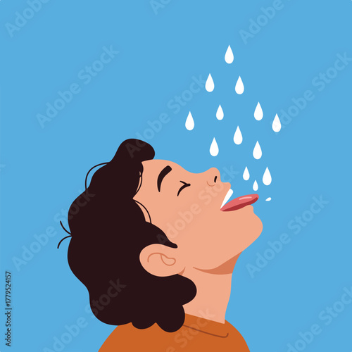 A person with dark hair looks upwards with mouth open, tongue out, catching raindrops. A light blue background