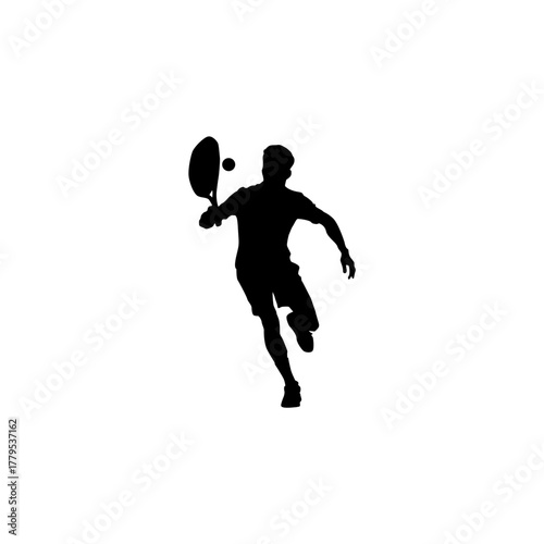 Silhouette of a male tennis player in action hitting a forehand shot with a racket