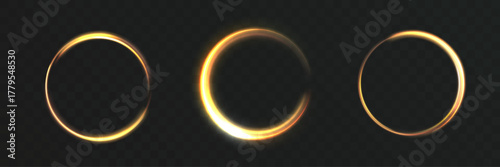 Set of glowing golden light rings, circular energy effect, abstract shining halo with motion blur on transparent background.
