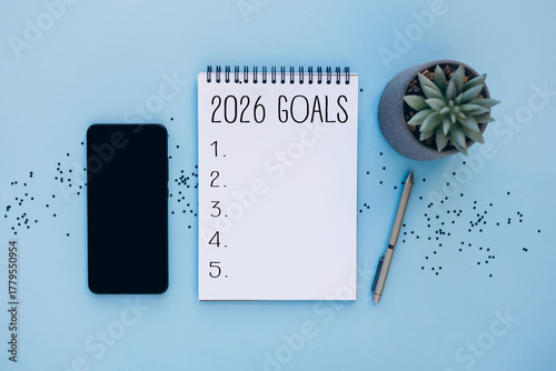 2026 goals planning concept with notebook and accessories. Concept of new year planning, goal setting, resolutions, productivity, personal development, and organization for 2026.
