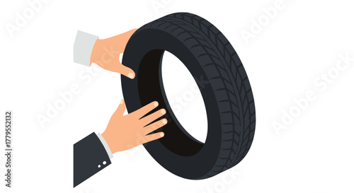 Hands holding car tire on white background