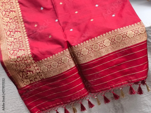 Handmade Indian silk sari, saree with golden details, woman wear on festival, ceremony and weddings, expensive sarees are famous for their gold and silver zari, brocade. Incredible India.