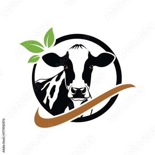 Stylized holstein cow head with green leaves and a swoosh element in a circular frame for dairy branding