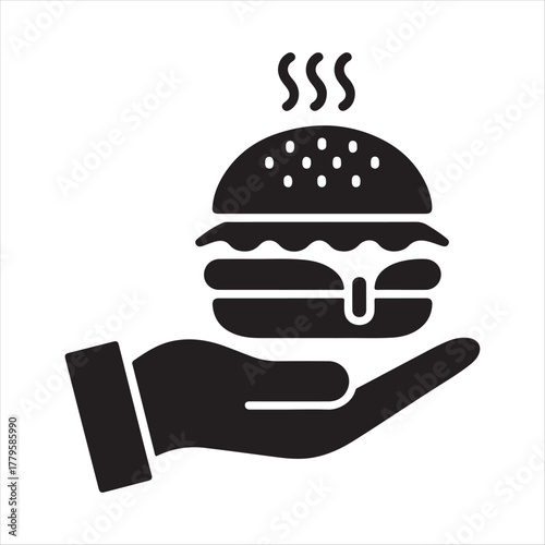 Hand holding a steaming hot burger with melted cheese and sesame seeds on a bun