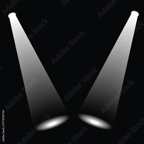 Spotlight illuminates a dark space creating dramatic lighting effects
