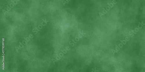 Abstract Elegant dark green background with mottled vintage texture in old fancy background design, texture of colored parchment paper.