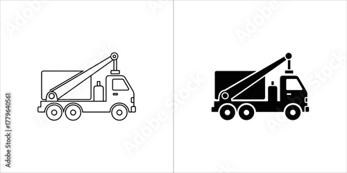 Tow truck with crane arm