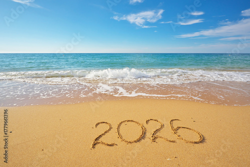 2026 text symbol of new year on the sea sand beach shore at daylight