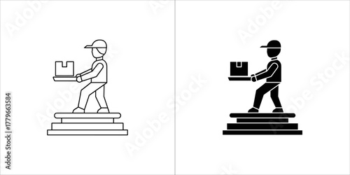 Delivery man carrying box up stairs