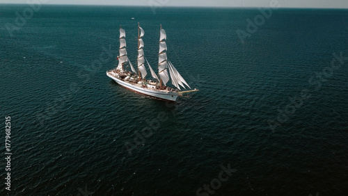 aerial view - tall ship at sea in full sail