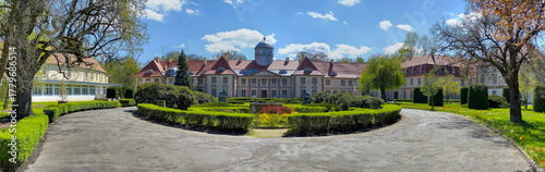 Stunning manor house with manicured hedges garden, Milicz, Poland